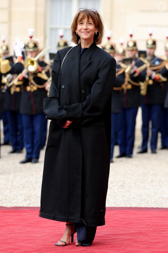 L'actrice Sophie Marceau - Arrivée des invités au dîner d'Etat en l'honneur du président chinois Xi Jinping et de sa femme la Première Dame Peng Liyuan au palais présidentiel de l'Elysée à Paris, France, le 6 mai 2024. © Stéphane Lemouton / Bestimage