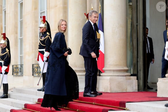 Delphine Arnault et son père Bernard Arnault - Arrivée des invités au dîner d'Etat en l'honneur du président chinois Xi Jinping et de sa femme la Première Dame Peng Liyuan au palais présidentiel de l'Elysée à Paris, France, le 6 mai 2024. © Cyril Moreau/Bestimage