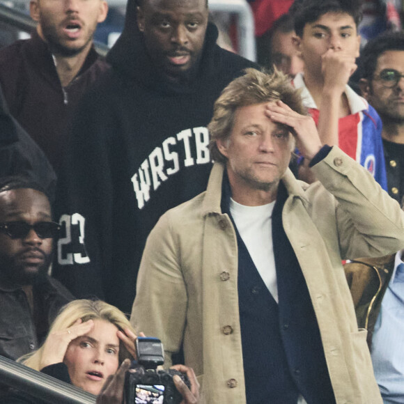 Alice Taglioni et son compagnon Laurent Delahousse - Célébrités dans les tribunes de la demi-finale retour de Ligue des champions entre le PSG face au Borussia Dortmund (0-1) au Parc des Princes à Paris le 7 mai 2024. © Cyril Moreau/Bestimage