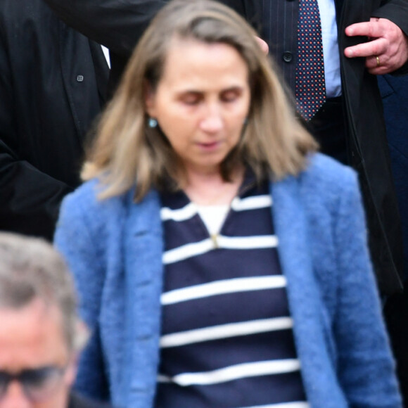 Bernard Perrut et la Première Dame Brigitte Macron - Obsèques du journaliste et homme de lettres Bernard Pivot en l'église du christ à Quincié-en-Beaujolais, France, le 14 mai 2024. 