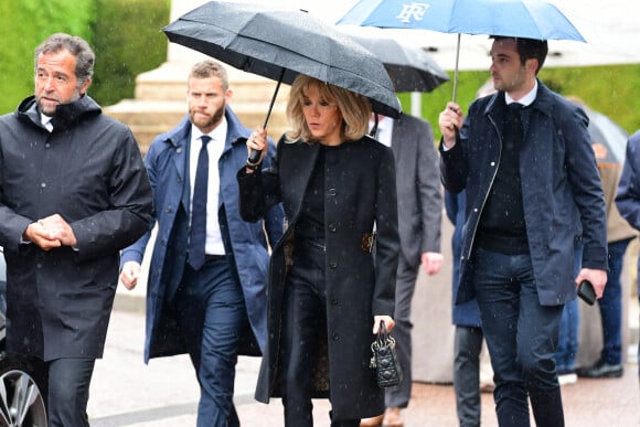 La Première Dame Brigitte Macron - Obsèques du journaliste et homme de lettres Bernard Pivot en l'église du christ à Quincié-en-Beaujolais, France, le 14 mai 2024.  No Web pour la Belgique et la Suisse Funeral of journalist and man of letters Bernard Pivot in the Church of Christ in Quincié-en-Beaujolais, France, on May 14, 2024.