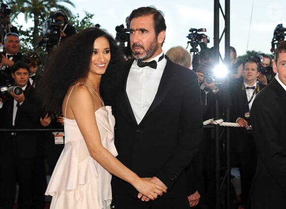 Eric Cantona et Rachida Brakni arrivent à la projection de 'Looking for Eric' pendant le 62ème Festival de Cannes au Palais des Festivals à Cannes, France, le 18 mai 2009. Photo par Nebinger-Orban/ABACAPRESS.COM