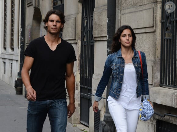 Le tennisman espagnol Rafael Nadal et sa petite amie Xisca Perello se promènent en amoureux en dehors des Internationaux de France de tennis à Paris, France, le 6 juin 2013. Photo by ABACAPRESS.COM