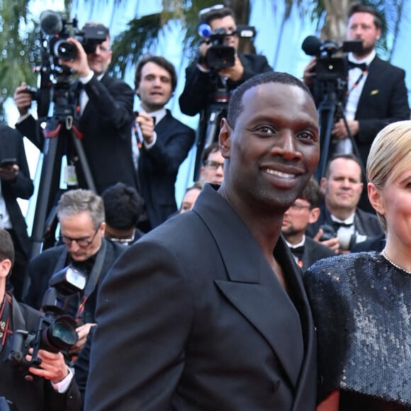 Omar Sy aux côtés de la présidente du jury Greta Gerwig à la première de "Megalopolis" dans le cadre du 77e Festival international du film de Cannes, le 16 mai 2024. Aurore Marechal/ABACAPRESS.COM