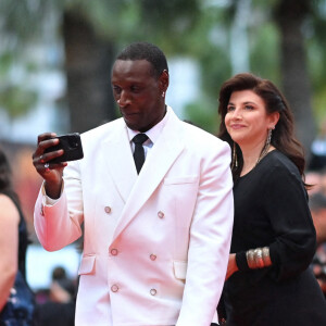 Omar Sy a-t-il commis un impair sur le tapis rouge du Festival de Cannes ?
Omar Sy assiste à "Le Deuxieme Acte : The Second Act Screening" à la cérémonie d'ouverture tapis rouge lors de la 77e édition du Festival de Cannes au Palais des Festivals. Franck Castel/ABACAPRESS.COM