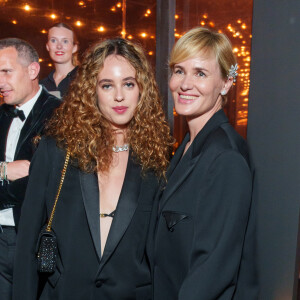 Judith Godreche et sa fille Tess Barthelemy, - Dîner "Women in Motion" par le groupe Kering, Place de la Castre, lors du 77ème Festival International du Film de Cannes le 19 mai 2024.