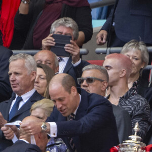 Le prince William, prince de Galles, et son fils le prince George de Galles, assistent à la finale de la coupe Emirates FA 2024 entre Manchester United et Manchester City au stade de Wembley à Londres, le 25 mai 2024. © SPP / Panoramic / Bestimage 