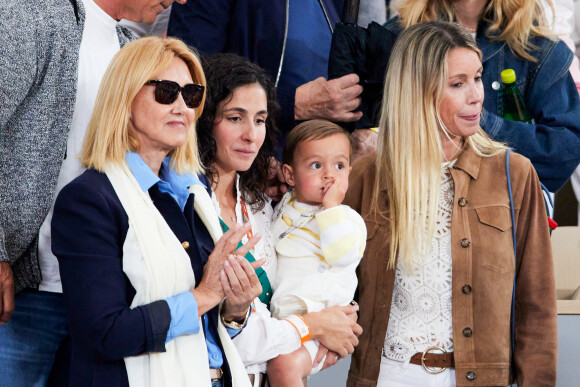 Ana Maria Parera (mère de Rafael Nadal), Xisca Perello (femme de Rafael Nadal), son fils Rafael Junior et Maria Isabel Nadal (soeur de Rafael Nadal) - La famille de Rafael Nadal (Rafa) dans les tribunes pour le premier tour des Internationaux de France de tennis de Roland Garros 2024 opposant Rafael Nadal (Rafa) à Alexander Zverev, à Paris, France, le 27 mai 2024. © Jacovides-Moreau/Bestimage