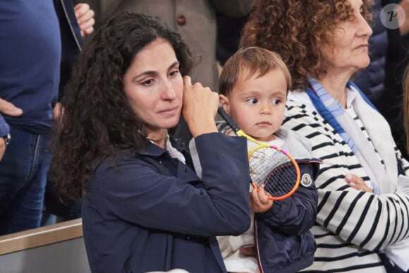 Xisca Perello (femme de Rafael Nadal) et son fils Rafael Junior - La famille de Rafael Nadal (Rafa) dans les tribunes pour le premier tour des Internationaux de France de tennis de Roland Garros 2024 opposant Rafael Nadal (Rafa) à Alexander Zverev, à Paris, France, le 27 mai 2024. © Jacovides-Moreau/Bestimage