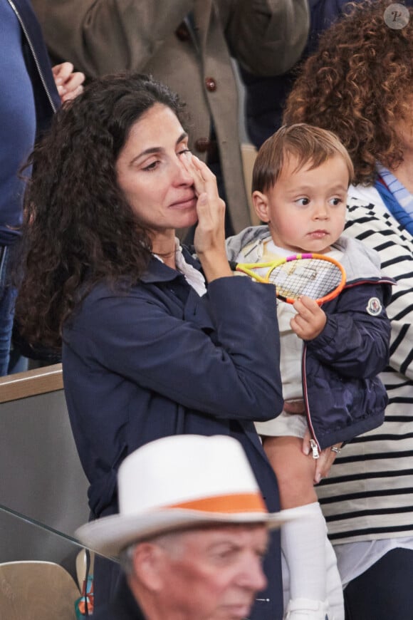 Xisca Perello (femme de Rafael Nadal) et son fils Rafael Junior - La famille de Rafael Nadal (Rafa) dans les tribunes pour le premier tour des Internationaux de France de tennis de Roland Garros 2024 opposant Rafael Nadal (Rafa) à Alexander Zverev, à Paris, France, le 27 mai 2024. © Jacovides-Moreau/Bestimage