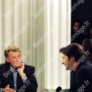 Philippe Gildas, Johnny Hallyday et Antoine de Caunes lors d'une émission "Nulle Part Ailleurs" de Canal+ en 1992. © Patrick Carpentier / Bestimage