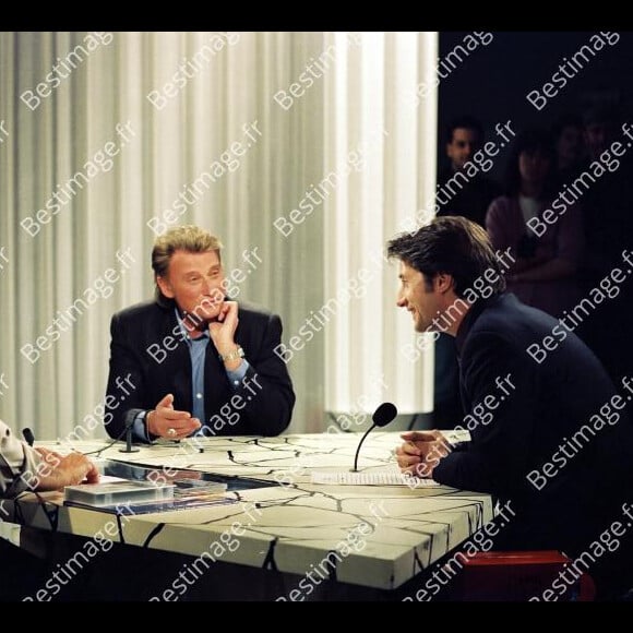 Philippe Gildas, Johnny Hallyday et Antoine de Caunes lors d'une émission "Nulle Part Ailleurs" de Canal+ en 1992. © Patrick Carpentier / Bestimage