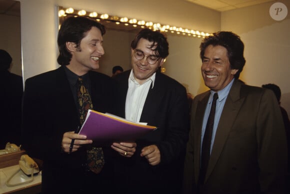 En France, à Paris, dans une loge dans les locaux de Canal+, Antoine de Caunes, Albert ALGOUD et Philippe Gildas en mai 1991.