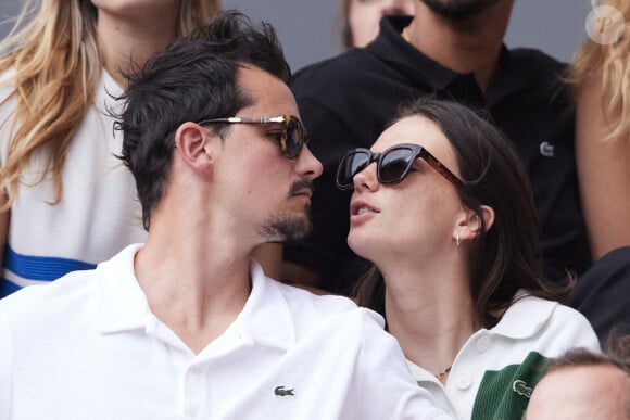 Juan Arbelaez et sa compagne Cassandre Verdier dans les tribunes des Internationaux de France de tennis de Roland Garros 2024 à Paris, France, le 4 juin 2024. © Jacovides-Moreau/Bestimage 