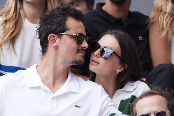 Juan Arbelaez et sa compagne Cassandre Verdier dans les tribunes des Internationaux de France de tennis de Roland Garros 2024 à Paris, France, le 4 juin 2024. © Jacovides-Moreau/Bestimage 