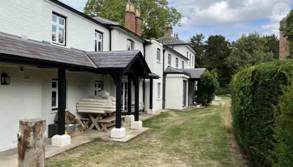 Lui et Meghan avaient dû rendre les clés de Frogmore Cottage
La reine Elisabeth II d'Angleterre ouvre au public les jardins de Frogmore House dans le cadre de l'événement caritatif "National Garden Scheme" au château de Windsor, le 30 août 2022. 