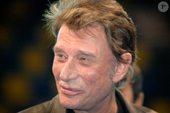 Johnny Hallyday au Noël des animaux organisé par la Fondation Bardot à Levallois-Perret, en 2004. Photos par APS-Medias/ABACAPRESS.COM