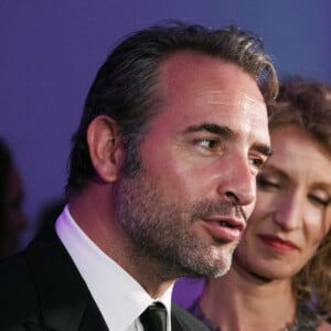 Jean Dujardin et Alexandra Lamy arrivant à la fête d'anniversaire du 65e Festival international du film de Cannes, au Palais des Festivals à Cannes, dans le sud de la France, le 20 mai 2012. Photo par Guignebourg-Genin/ABACAPRESS.COM