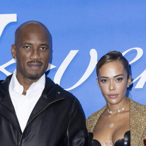 Didier Drogba et Gabrielle Lemaire au photocall du défilé Homme Louis Vuitton Printemps/Été 2025 dans le cadre de la Fashion Week de Paris, France, le 18 juin 2024. © Olivier Borde/Bestimage 