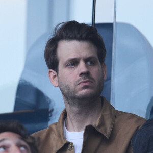 Alessandro Belmondo - Célébrités dans les tribunes du match de Ligue 1 Uber Eats "PSG-Toulouse" (1-3) au Parc des Princes à Paris le 12 mai 2024. © Cyril Moreau/Bestimage