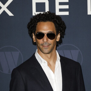 "Il m'a pris avec lui, il faisait à manger, il m'amenait à l'école, il s'occupait de mes vacances", ajoute Tomer Sisley
 
Tomer Sisley - Avant-Premiere du film "Largo Winch "Le Prix de L'argent" au cinéma le Grand Rex à Paris le 18 juin 2024. © Marc Ausset-Lacroix/Bestimage