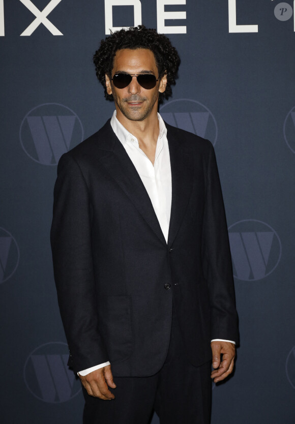 "Il m'a pris avec lui, il faisait à manger, il m'amenait à l'école, il s'occupait de mes vacances", ajoute Tomer Sisley
 
Tomer Sisley - Avant-Premiere du film "Largo Winch "Le Prix de L'argent" au cinéma le Grand Rex à Paris le 18 juin 2024. © Marc Ausset-Lacroix/Bestimage