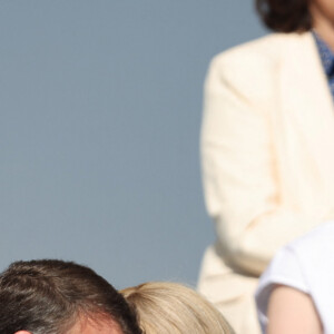 Emmanuel Macron et sa femme Brigitte en tribune présidentielle lors de la cérémonie du 144ème défilé militaire du 14 juillet, jour de la Fête Nationale, à Paris, le 14 juillet 2024