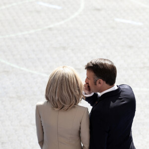 Le président de la République, Emmanuel Macron, Brigitte Macron lors de la cérémonie du 144ème défilé militaire du 14 juillet, jour de la Fête Nationale, avenue Foch à Paris, le 14 juillet 2024