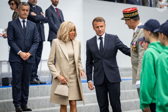 Emmanuel Macron, président de la République avec son épouse Brigitte à la cérémonie du 144ème défilé militaire du 14 juillet, jour de la Fête Nationale, à Paris