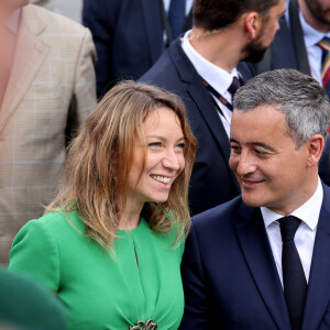 Gérald Darmanin, ministre de l'Intérieur et des Outre-mer, et sa femme Rose-Marie Devillers lors d'un bain de foule à la cérémonie du 144ème défilé militaire du 14 juillet, jour de la Fête Nationale, à Paris, France, le 14 juillet 2024