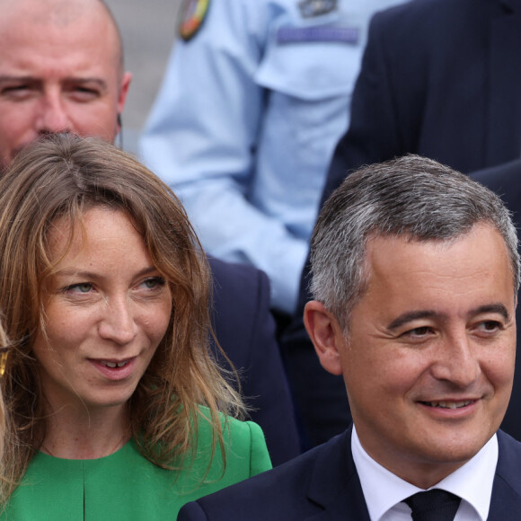 La Première Dame française Brigitte Macron, Gérald Darmanin, ministre de l'Intérieur et des Outre-mer, et sa femme Rose-Marie Devillers lors d'un bain de foule à la cérémonie du 144ème défilé militaire du 14 juillet, jour de la Fête Nationale, à Paris, France, le 14 juillet 2024
