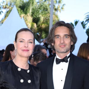 Carole Bouquet et son fils Dimitri Rassam - Montée des marches du film " Megalopolis " lors du 77ème Festival International du Film de Cannes, au Palais des Festivals à Cannes.