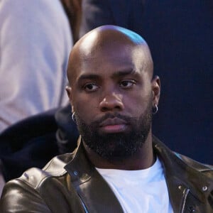 Teddy Riner - Célébrités dans les tribunes lors du quart de finale aller de Ligue des champions: Le PSG s'est incliné à domicile face au FC Barcelone (2-3) au Parc des Princes à Paris le 10 avril 2024. © Cyril Moreau/Bestimage 