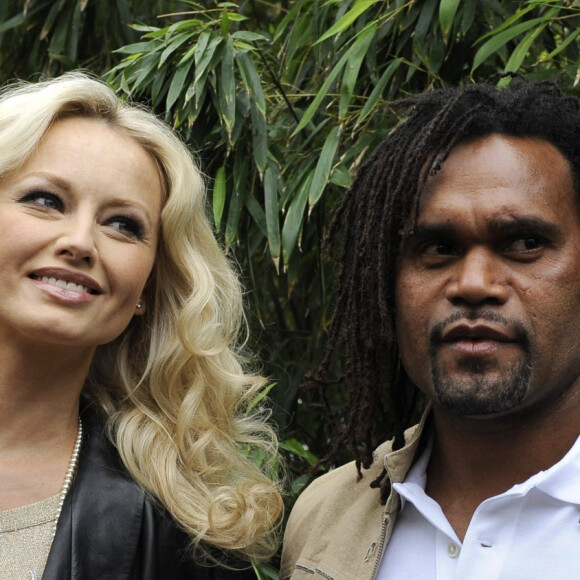 Adriana Karembeu et Christian Karembeu dans le Village avant la finale des Internationaux de France de Tennis 2010 à Roland Garros à Paris, le 6 juin 2010. Willis Parker/ABACAPRESS.COM