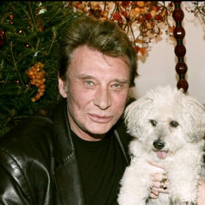 Brigitte Bardot et Johnny Hallyday au Noël des animaux SPA 2004 à Levallois Perret.