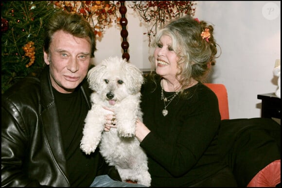 Brigitte Bardot et Johnny Hallyday au Noël des animaux SPA 2004 à Levallois Perret.