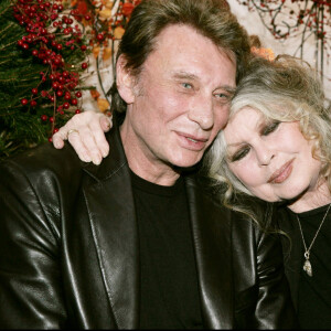 Brigitte Bardot et Johnny Hallyday au Noël des animaux SPA 2004 à Levallois Perret.