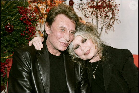 Brigitte Bardot et Johnny Hallyday au Noël des animaux SPA 2004 à Levallois Perret.