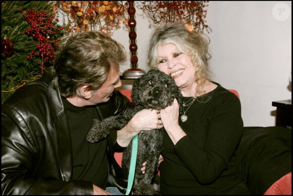 Brigitte Bardot et Johnny Hallyday au Noël des animaux SPA 2004 à Levallois Perret.