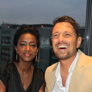 Exclusif - Hapsatou Sy et son mari Vincent Cerruti - Le Grand Dîner du 14 juillet, sur le rooftop de l'hôtel Pullman Tour Eiffel à Paris, France, le 14 juillet 2021. © Philippe Baldini/Bestimage