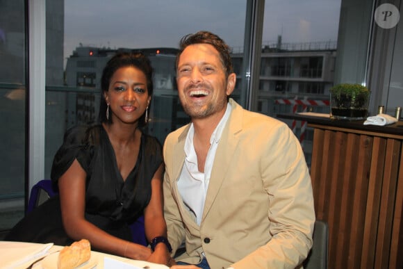 Exclusif - Hapsatou Sy et son mari Vincent Cerruti - Le Grand Dîner du 14 juillet, sur le rooftop de l'hôtel Pullman Tour Eiffel à Paris, France, le 14 juillet 2021. © Philippe Baldini/Bestimage