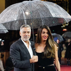 George Clooney a confié au magazine GQ qu'il ne voulait plus réaliser de films, mais seulement jouer dedans.
George Clooney et Amal Clooney arrivent pour une projection spéciale britannique de The Boys in the Boat au Curzon Mayfair, centre de Londres, Royaume-Uni, dimanche 3 décembre 2023. Photo par Ian West/PA Wire/ABACAPRESS.COM