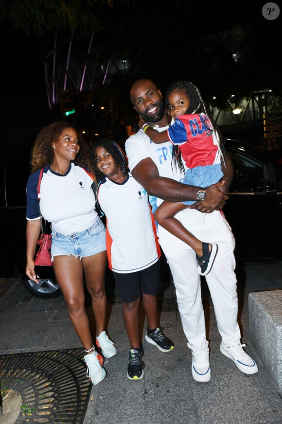 Exclusif - Teddy Riner avec sa femme Luthna et ses enfants Eden et Ysis - Teddy Riner fête son titre de champion Olympique de judo en équipe mixte au restaurant "Podium" du groupe (Les bistrots Pas Parisiens) à Paris le 3 aout 2024. © Rachid Bellak/Bestimage 