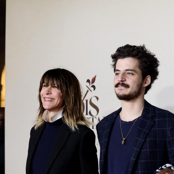 Sophie Marceau et son fils Vincent Zulawski, Eye Haïdara. Photocall de l'avant-première du film "Les Trois Mousquetaires : D'Artagnan" aux Invalides à Paris le 21 mars 2023. © Jacovides / Moreau / Guirec / Bestimage