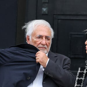 Dominique Strauss-Kahn (DSK) et sa compagne Myriam L'Aouffir - Sorties des obsèques de Henri Leclerc en la salle de la Coupole du crématorium du Père-Lachaise à Paris, France, le 9 septembre 2024. © Dominique Jacovides/Bestimage