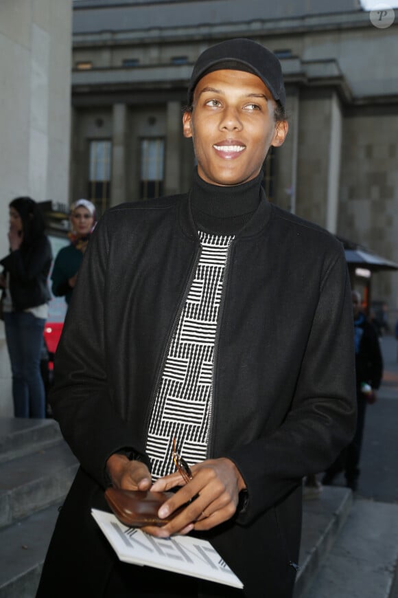 Le chanteur Stromae - Défilé de mode "Kenzo" collection prêt-à-porter Printemps-Eté 2017 lors de la Fashion Week de Paris à la Cité de l'architecture et du patrimoine au Trocadéro à Paris, France, le 4 octobre 2016. © Christophe Aubert via Bestimage