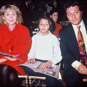 ARCHIVES - Marie-Anne Chazel, Christian Clavier et leur filel Margot lors d'un défilé de mode en 1992.