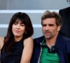 A rappeler que la chanteuse file le parfait amour avec Arnaud Clément avec qui elle a eu un petit Marin en 2017.
Nolwenn Leroy et son compagnon Arnaud Clément - dans les tribunes des Internationaux de France de tennis de Roland Garros 2024 à Paris le 7 juin 2024. © Jacovides-Moreau/Bestimage 