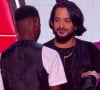 Selon la production de "The Voice Kids" contactée par "Télé-Loisirs", Slimane était en réalité malade
Slimane dans "The Voice Kids" sur TF1