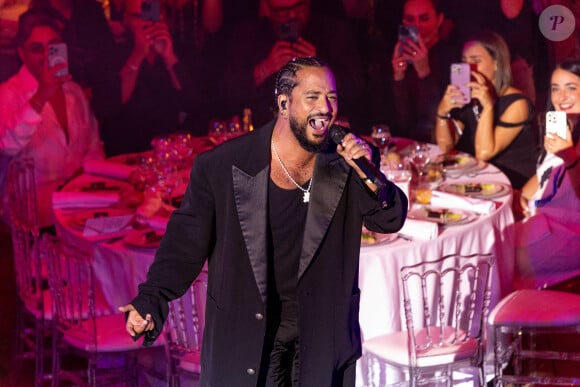 Slimane se produit lors du Grand Dîner de la 77e édition du Festival de Cannes autour d'un gala avec l'artiste Slimane dans le cadre exceptionnel du Palais Bulles de Pierre Cardin à Théoule-sur-Mer, France, le samedi 18 mai 2024. Photo par Cyril CHATEAU / ABACAPRESS.COM